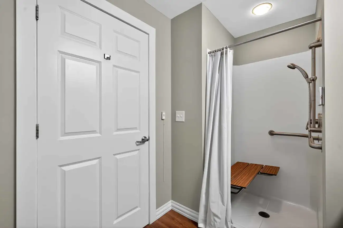 a bathroom with a walkin shower