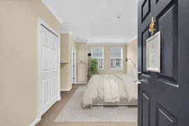 interior of a condo with a bed